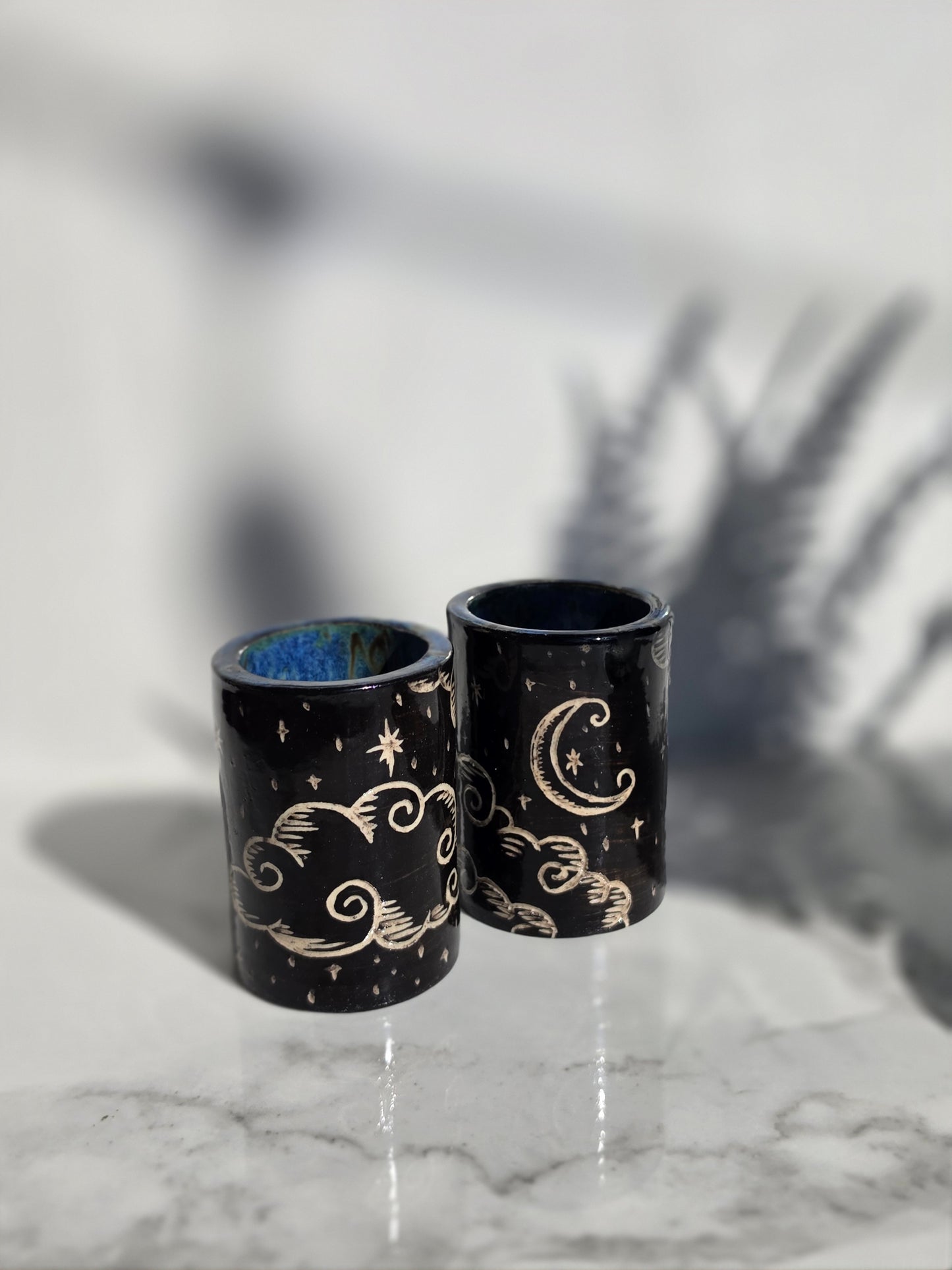 Hand-Carved Celestial Shot Glass Pair