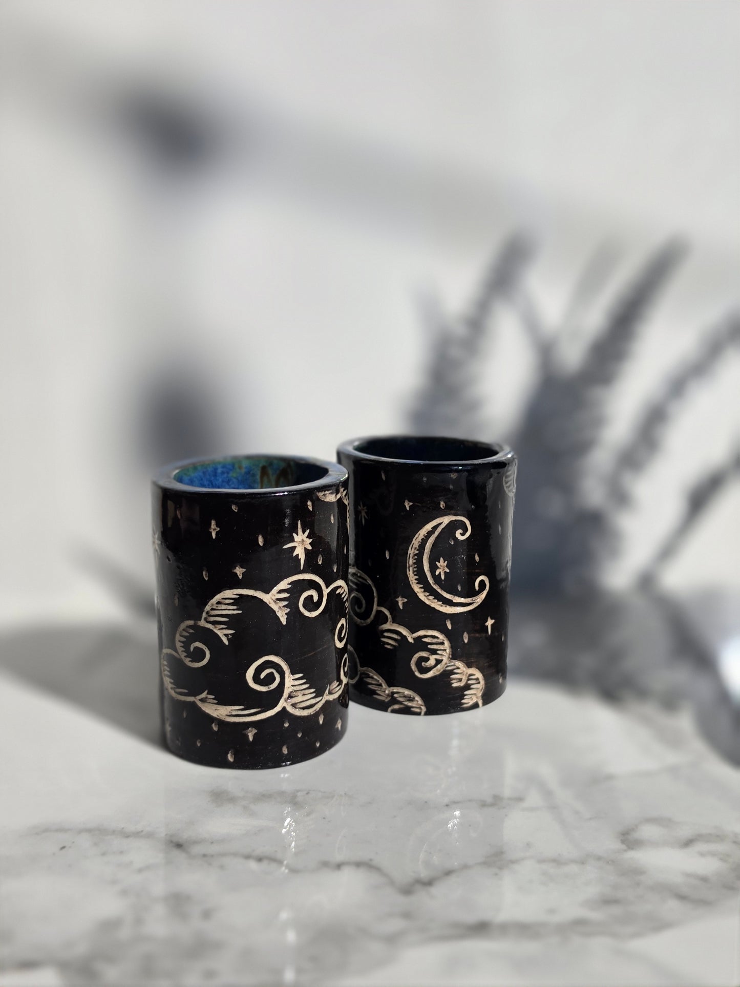 Hand-Carved Celestial Shot Glass Pair