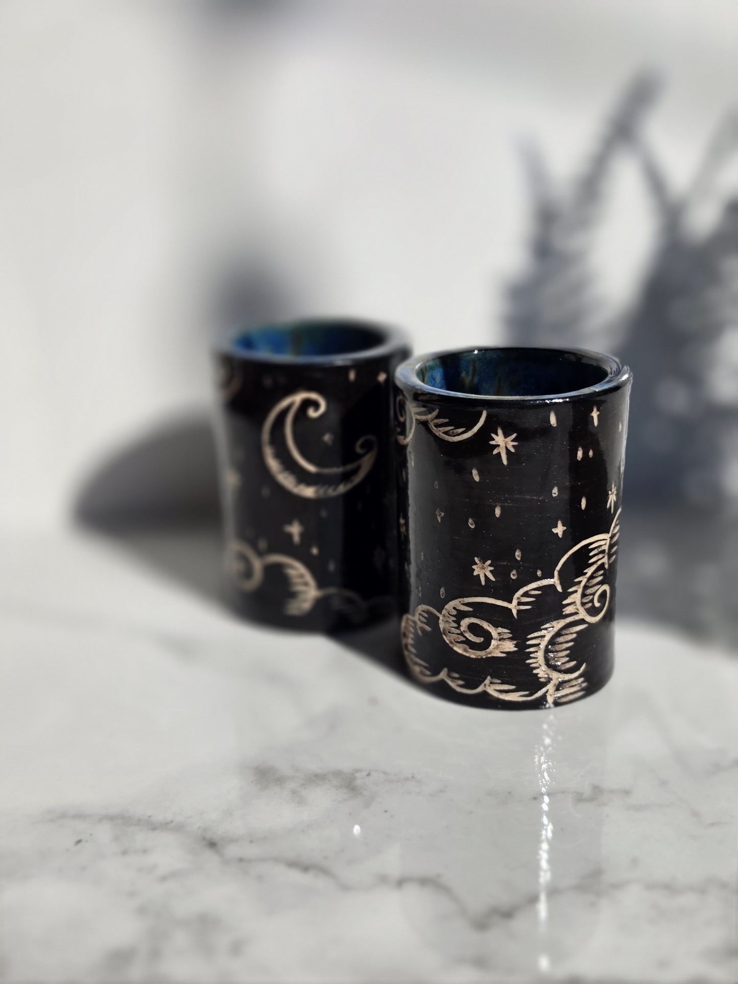 Hand-Carved Celestial Shot Glass Pair