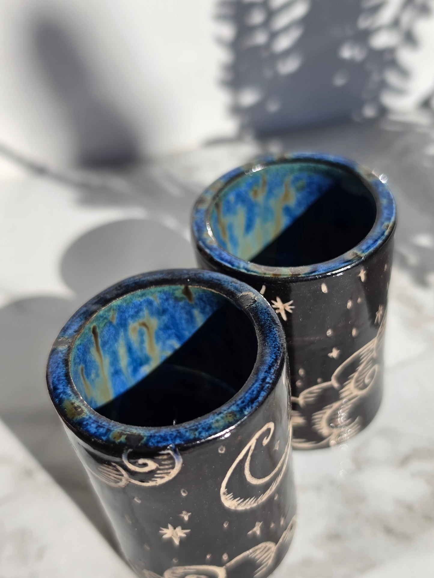 Hand-Carved Celestial Shot Glass Pair
